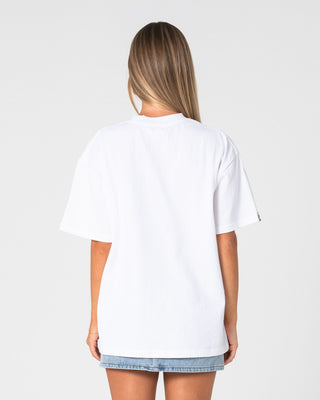 Woman wearing Wavers Tide Oversize Short Sleeve Tee in White / Retro Blue