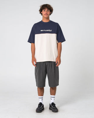 Man wearing Infinity Short Sleeve Tee in Cream
