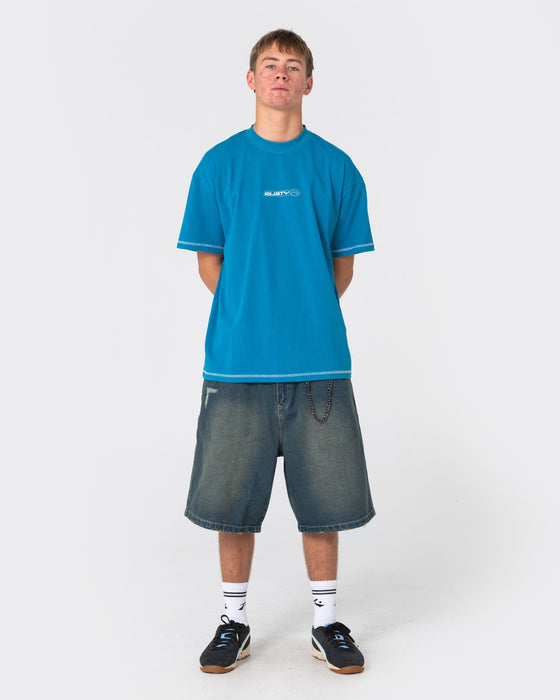 man-wearing-bus-down-short-sleeve-tee-in-petrol-blue