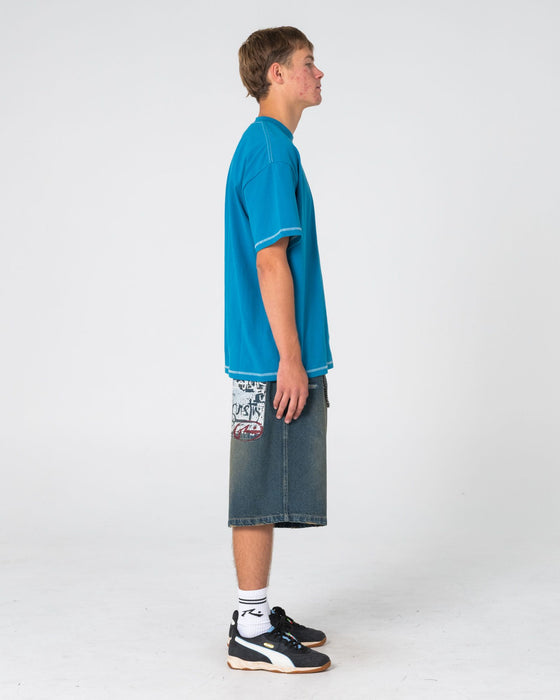 man-wearing-bus-down-short-sleeve-tee-in-petrol-blue
