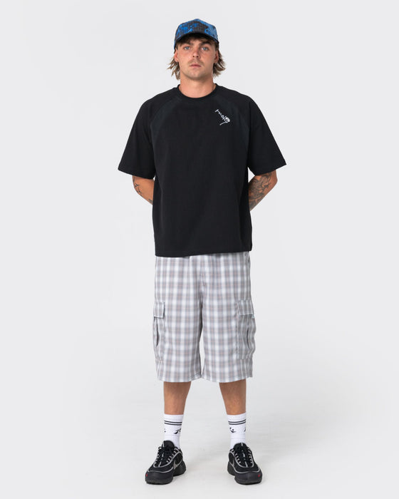 man-wearing-avalanche-short-sleeve-tee-in-black