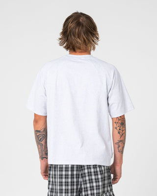 Man wearing Avalanche Short Sleeve Tee in Ecru Marle