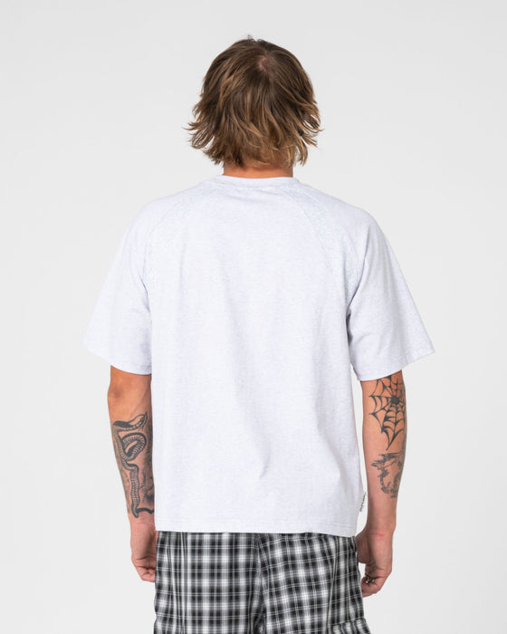 man-wearing-avalanche-short-sleeve-tee-in-ecru-marle