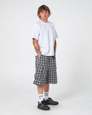 Man wearing Avalanche Short Sleeve Tee in Ecru Marle
