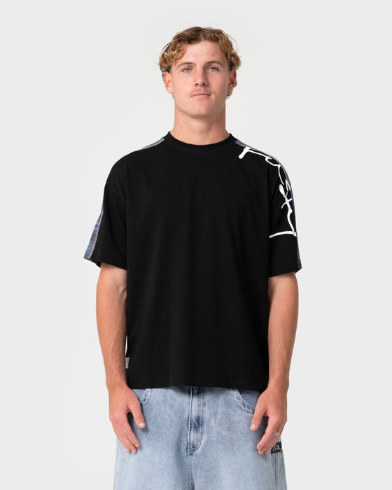 man-wearing-lost-it-short-sleeve-tee-in-black