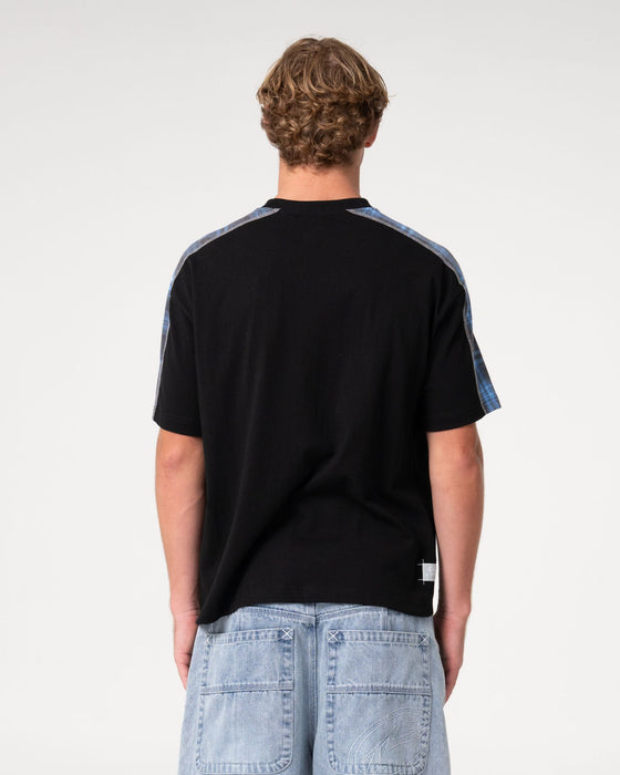 man-wearing-lost-it-short-sleeve-tee-in-black