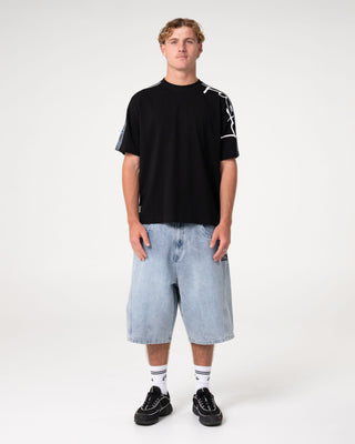 Man wearing Lost It Short Sleeve Tee in Black