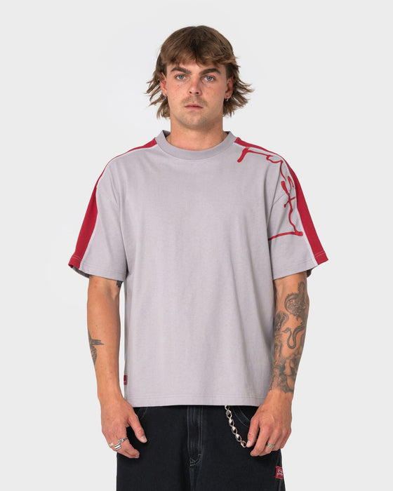 man-wearing-lost-it-short-sleeve-tee-in-stone-grey