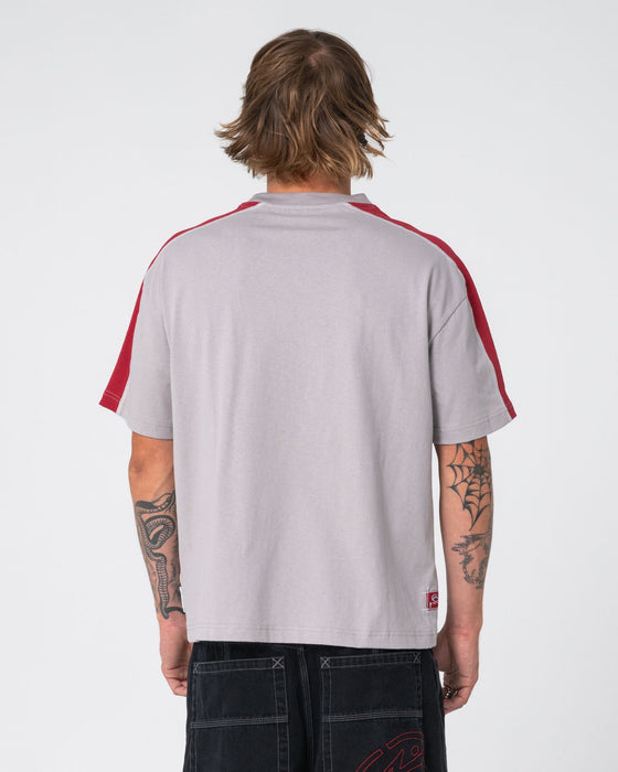 man-wearing-lost-it-short-sleeve-tee-in-stone-grey