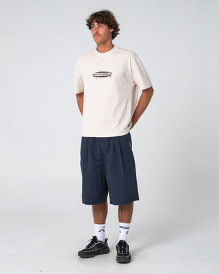 Man wearing Can O Paint Short Sleeve Tee in Cream