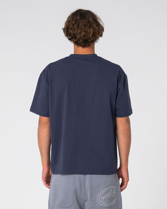man-wearing-can-o-paint-short-sleeve-tee-in-dark-blue