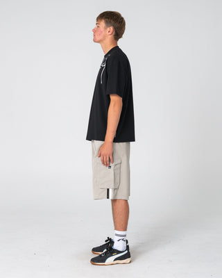 Man wearing Kurban Sprawl Short Sleeve Tee in Black