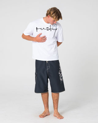 Man wearing Kurban Sprawl Short Sleeve Tee in White