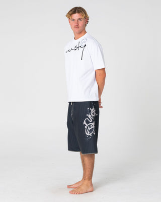 Man wearing Kurban Sprawl Short Sleeve Tee in White
