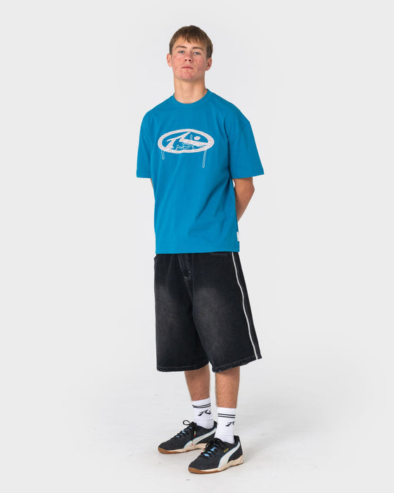 man-wearing-picky-short-sleeve-tee-in-petrol-blue