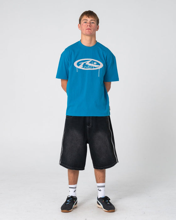 man-wearing-picky-short-sleeve-tee-in-petrol-blue