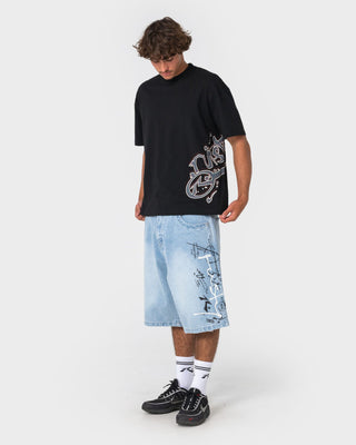 Man wearing Art Attack Short Sleeve Tee in Black
