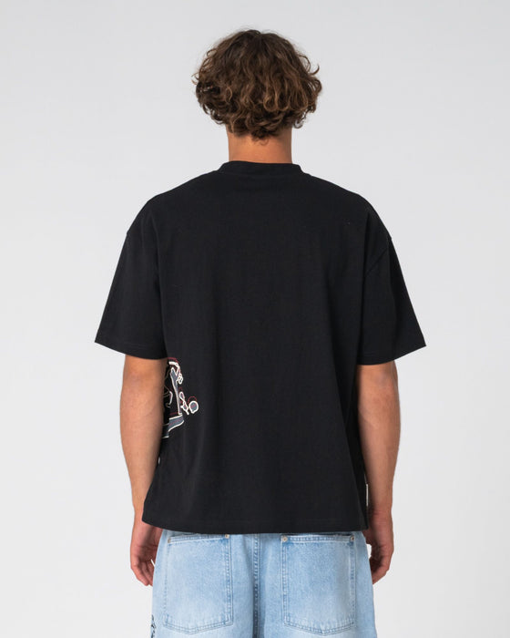 man-wearing-art-attack-short-sleeve-tee-in-black