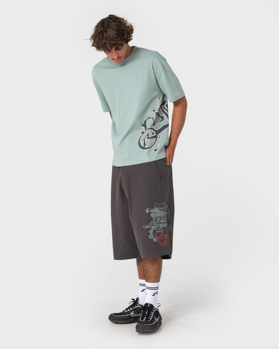 man-wearing-art-attack-short-sleeve-tee-in-seafoam