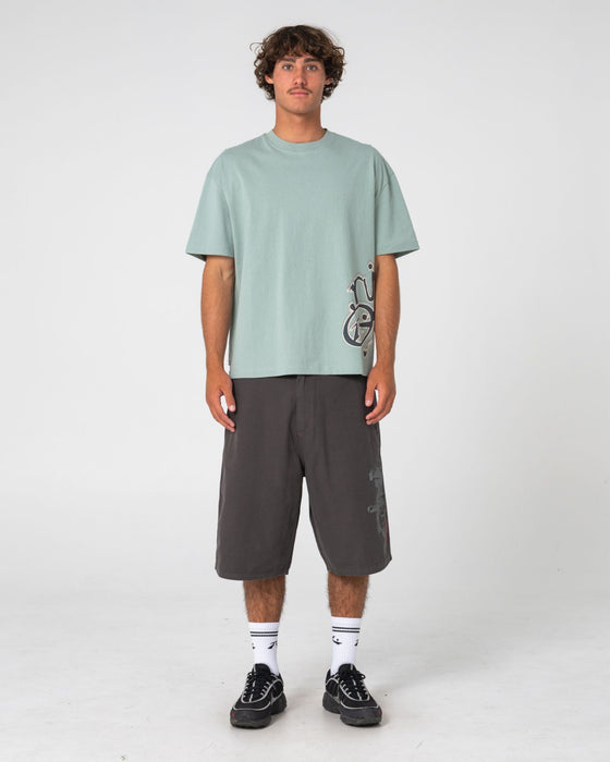 man-wearing-art-attack-short-sleeve-tee-in-seafoam