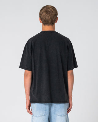 Man wearing Monty 2.0 Short Sleeve Tee in Washed Black