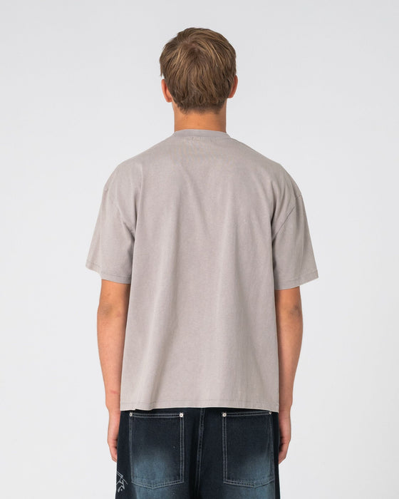 man-wearing-monty-2-0-short-sleeve-tee-in-washed-grey