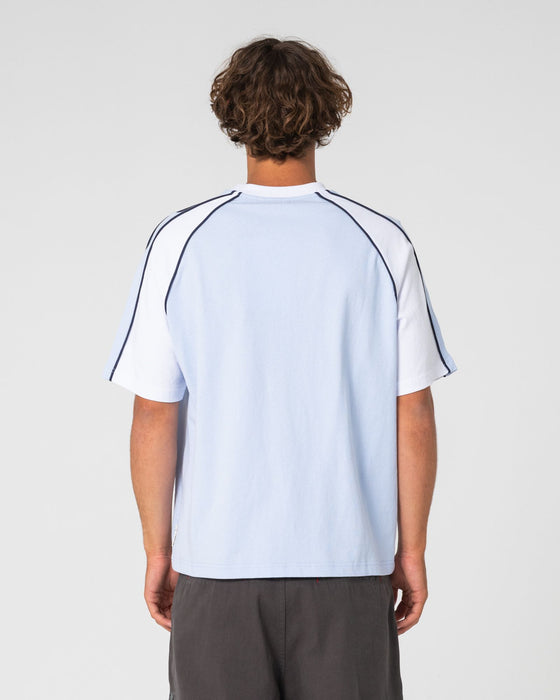 man-wearing-tekka-short-sleeve-tee-in-sky-blue