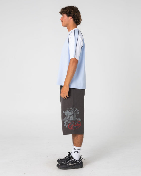 man-wearing-tekka-short-sleeve-tee-in-sky-blue