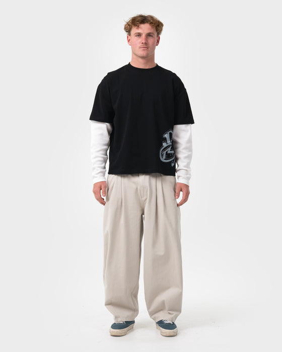 man-wearing-trackside-mock-long-sleeve-tee-in-black