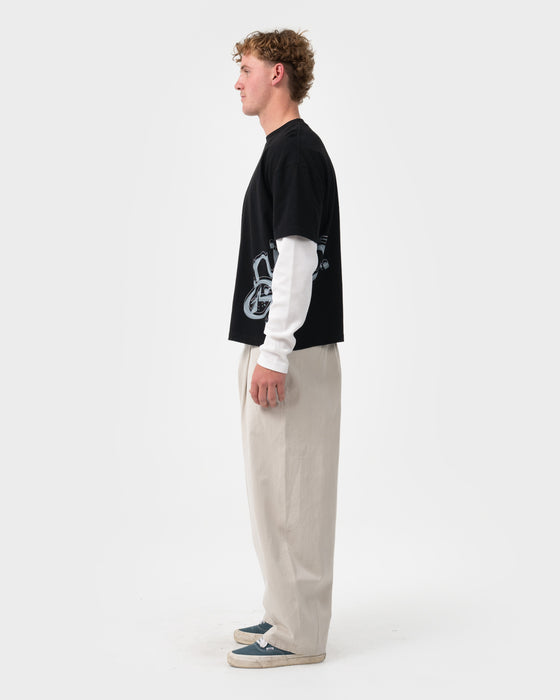 man-wearing-trackside-mock-long-sleeve-tee-in-black