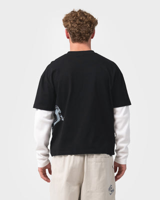 Man wearing Trackside Mock Long Sleeve Tee in Black