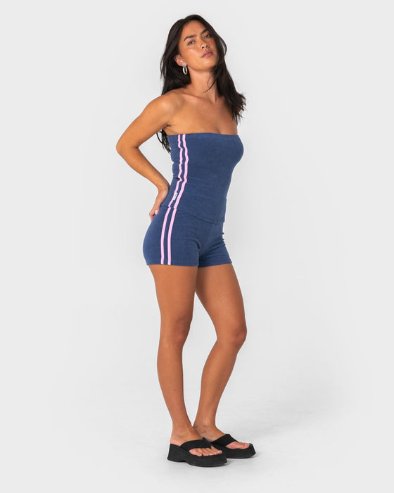 woman-wearing-lamar-towelling-booty-short-in-navy-blue-pink