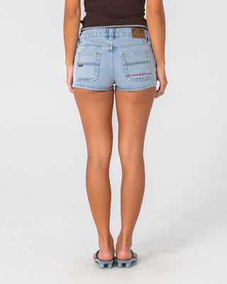 Woman wearing Punch Low Rise Micro Mini Short in True Blue