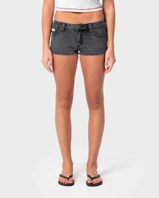 Woman wearing Punch Low Rise Micro Mini Short in Washed Black