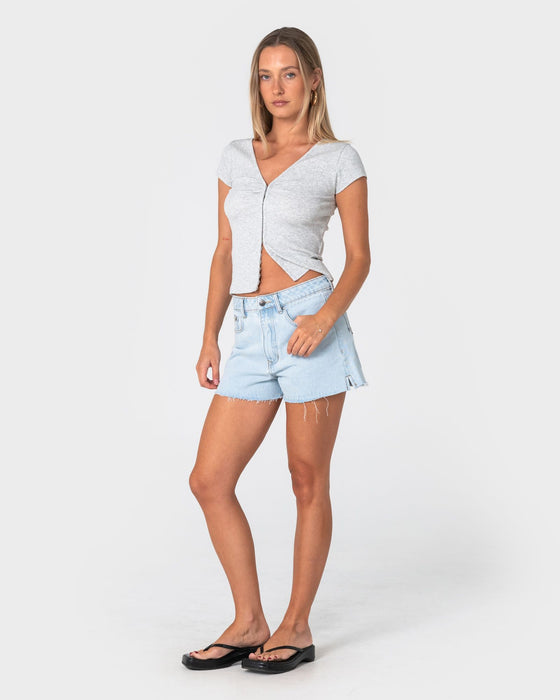 woman-wearing-penny-kick-flare-denim-short-2-0-in-sky-blue-heather