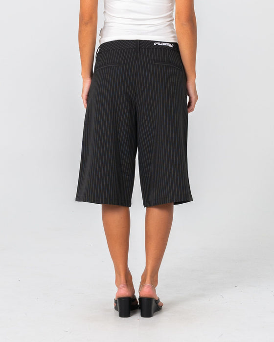 woman-wearing-big-bad-finance-mommy-low-rise-short-in-black-pinstripe