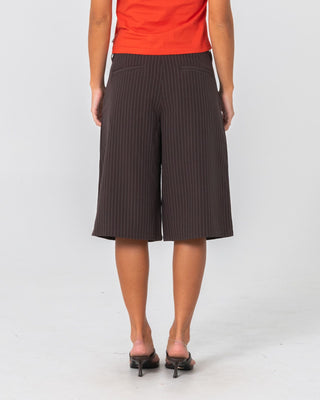 Woman wearing Big Bad Finance Mommy Low Rise Short in Java Pinstripe