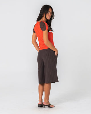 Woman wearing Big Bad Finance Mommy Low Rise Short in Java Pinstripe