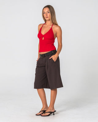 Woman wearing Big Bad Finance Mommy Low Rise Short in Java Pinstripe