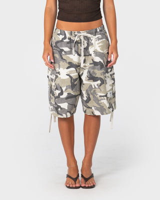 Woman wearing River Camo Low Rise Baggy Cargo Short in Camo
