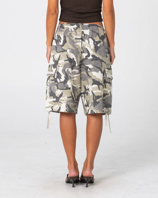 Woman wearing River Camo Low Rise Baggy Cargo Short in Camo