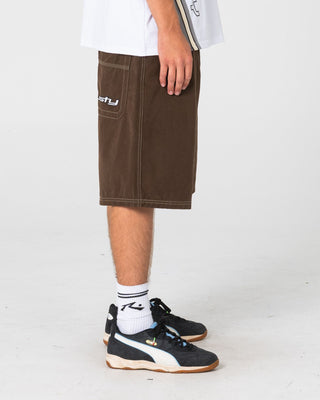 Man wearing Flip Daddy Elastic Baggy Short in Pinecone