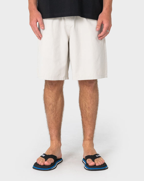 man-wearing-rumble-elastic-short-in-stone