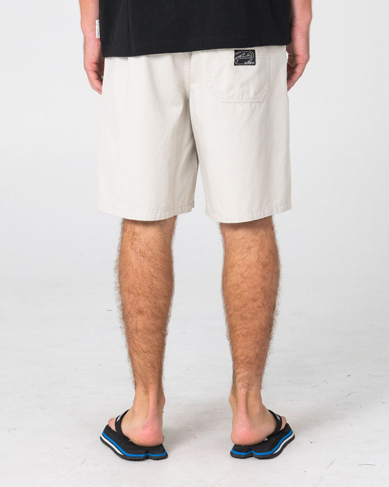 man-wearing-rumble-elastic-short-in-stone