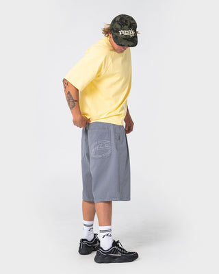 Man wearing Enigma Pleated Short in Grey