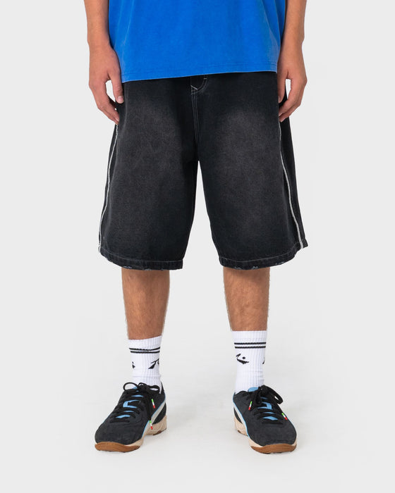man-wearing-flip-daddy-loaded-jort-in-blasted-black-out