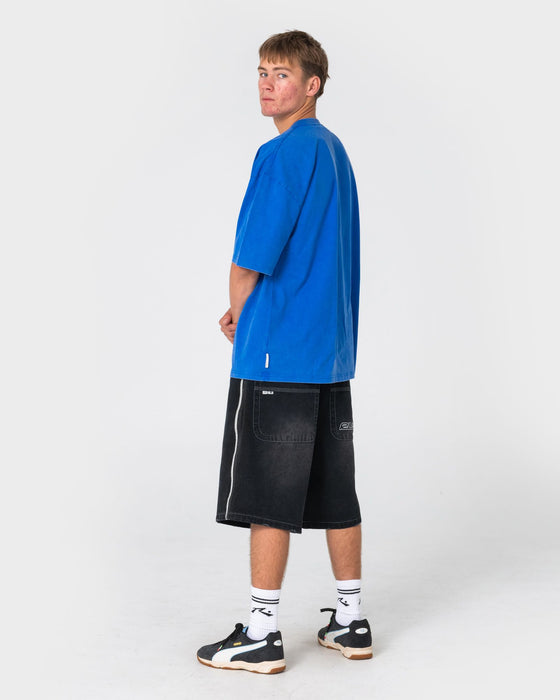 man-wearing-flip-daddy-loaded-jort-in-blasted-black-out