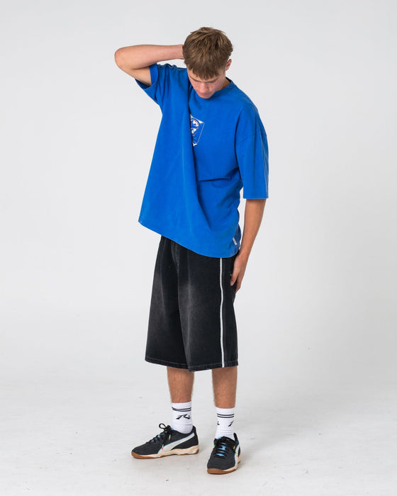 man-wearing-flip-daddy-loaded-jort-in-blasted-black-out
