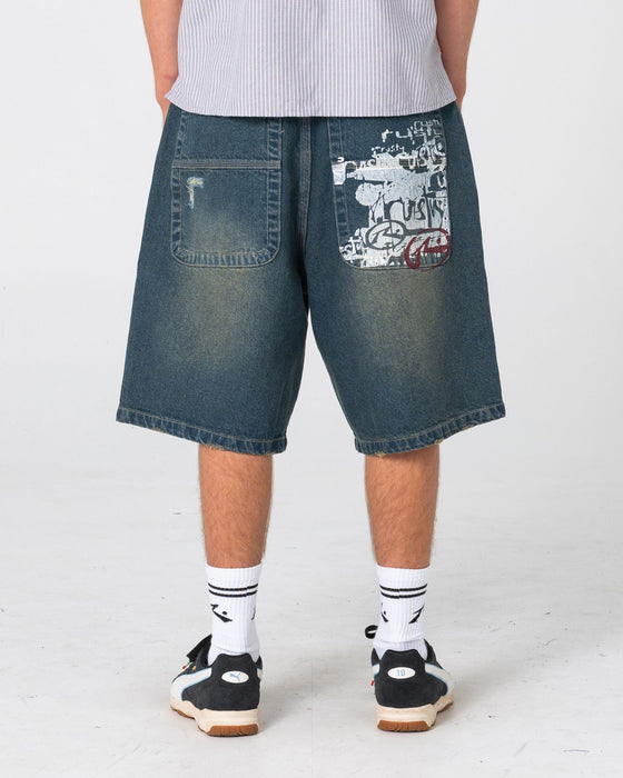 man-wearing-riddler-wide-baggy-jort-in-dark-n-dirty