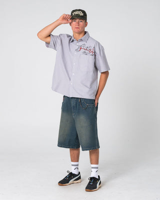 Man wearing Riddler Wide Baggy Jort in Dark N Dirty